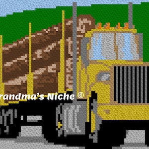 Puede incluir: Un camión de juguete amarillo y marrón con una carga de troncos. El camión tiene una parrilla negra y ruedas negras. El camión está sobre un fondo gris. Grandma's Niche está impreso en la parte inferior izquierda de la imagen.