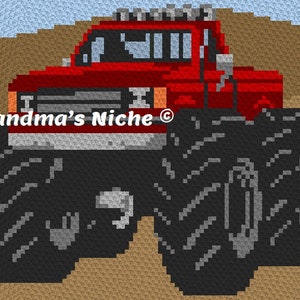 May include: A red monster truck with large black tires and a white grill. The truck is on a brown background.