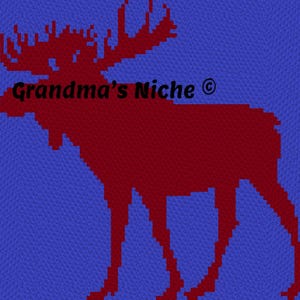 May include: A dark red pixelated moose silhouette centred on a vibrant blue background. The text Grandma's Niche with a copyright symbol is printed in black across the upper portion of the moose figure, creating a distinct graphic design.