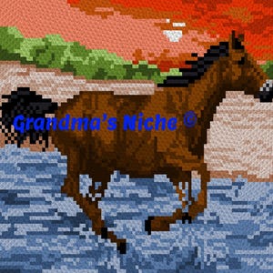 May include: A pixel art style cross stitch pattern featuring a brown horse running through blue water against a sunset background with green trees and a sandy bank. The text Grandma's Niche is printed in blue across the center of the image.