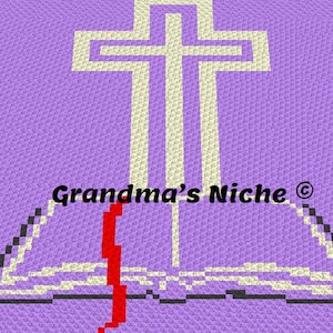 Puede incluir: Una manta de crochet morada con una cruz blanca y un libro blanco abierto con una línea roja en el centro. El texto "Grandma's Niche ©" está en el centro de la manta.