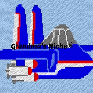 May include: A crochet pattern design featuring a blue, white, and red spacecraft graphic on a light blue background. The image includes the text Grandma's Niche in black lettering across the center of the pixelated space vehicle illustration.