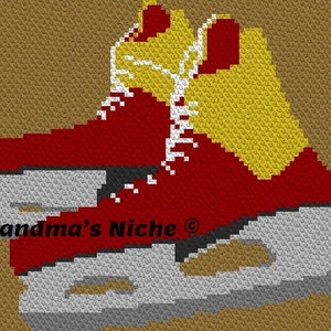 Peut inclure: Une paire de patins à glace rouges et jaunes avec des lacets blancs. Les patins sont sur un fond gris et blanc. Le texte "Grandma's Niche ©" est visible dans le coin inférieur gauche de l'image.