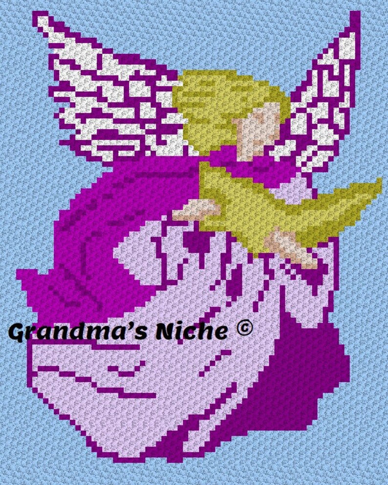 May include: A crocheted angel with purple and white clothing, holding a yellow bird in its arms. The angel has blonde hair and white wings. The background is light blue. The text "Grandma's Niche&reg;" is visible in the lower left corner of the image.
