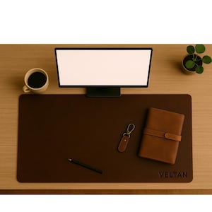 Top-down workstation, brown full grain leather desk mat used as leather laptop mat, notebook and pen