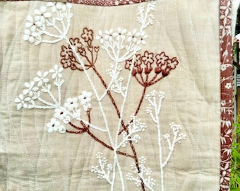 Embroidered shoulder bag