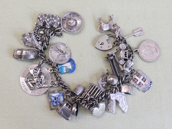 Vintage 1960s Sterling Silver Charm Bracelet With 29 Charms 