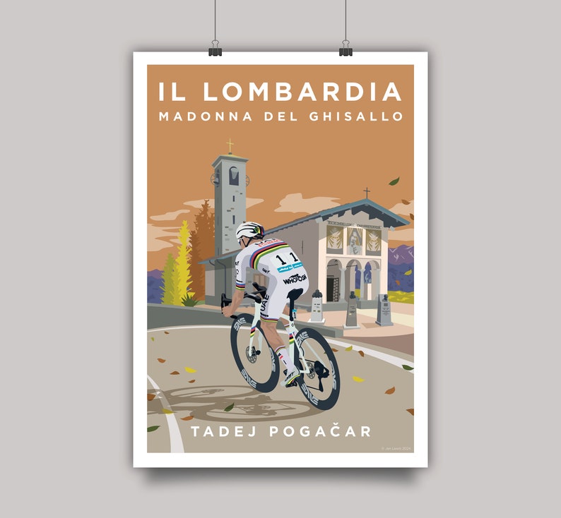 May include: A cyclist in a white and blue jersey rides a white bicycle up a hill towards a church with the words "IL LOMBARDIA MADONNA DEL GHISALLO" and "TADEJ POGAČAR" printed below. The scene is set against a sunset backdrop with fall leaves on the ground.