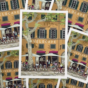 Prints laid out on top of each other.  All prints show a sun-dappled European Cafe, with yellow wall, pink awnings and green shutters. There are cyclists and other customers at the cafe.