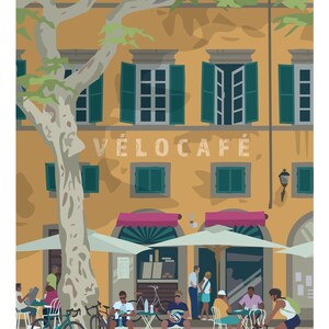 An evocative print of a sun-dappled European Cafe, with yellow wall, pink awnings and green shutters. A grey bark tree framing the image. People are sitting at tables including two male cyclists who have stopped for a break. Female cyclist riding by.
