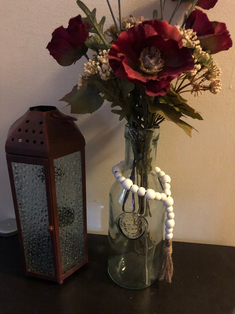Wooden bead vase garland