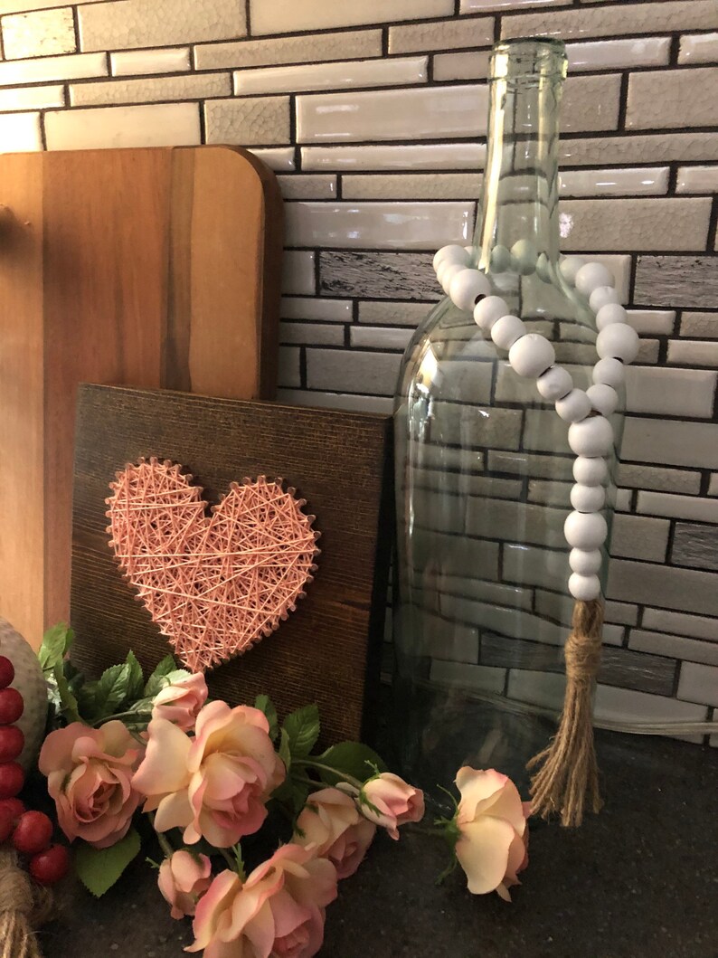 Wooden bead vase garland