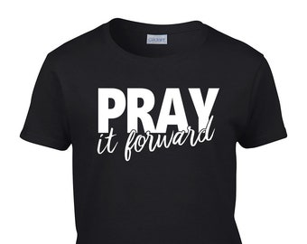 May include: Black t-shirt with white text that reads "Pray it forward".
