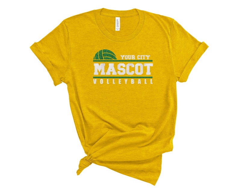 May include: Yellow t-shirt with a green volleyball graphic and the text "YOUR CITY MASCOT VOLLEYBALL".