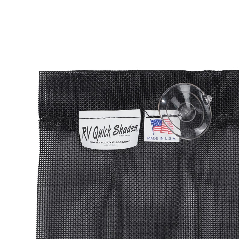 May include: Black mesh RV Quick Shades with a clear suction cup attached. The product has a white tag with the brand name and website, and another tag with the American flag and "Made in U.S.A."