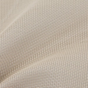May include: Close-up of a beige woven fabric with a textured, basket-weave pattern. The fabric is folded, creating shadows and highlighting the weave's intricate detail. The neutral color suggests versatility for various applications.