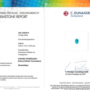 May include: Gemstone report from C. Dunaigre, Switzerland, detailing a greenish-blue Paraiba Tourmaline. The oval-cut gemstone weighs 2.93 ct and measures 10.81 x 7.67 x 5.09 mm. The report includes identification details and comments.