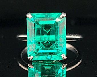 Vintage 14k white gold engagement ring 6.31ct. green emerald in rectangular shape