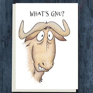 May include: A greeting card featuring a cartoon wildebeest with a surprised expression. The text "WHAT'S GNU?" is printed above the animal's head in black. The wildebeest is colored in shades of tan and brown.