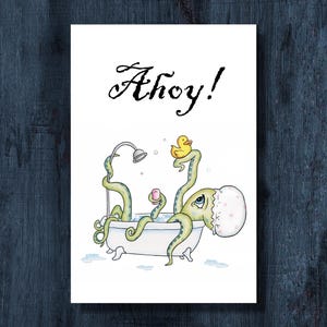 May include: A whimsical illustration of an octopus in a bathtub, with the word "Ahoy!" above. The octopus has green tentacles and a pink-spotted head, with a rubber ducky and soap in the tub. A shower head is also visible.