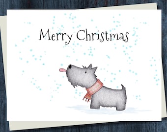 May include: A Christmas card featuring a gray Scottish Terrier wearing a red and pink scarf, with its tongue sticking out. The words "Merry Christmas" are written above the dog, with snowflakes scattered around.