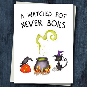 May include: Greeting card with the text "A Watched Pot Never Boils." The card features a cauldron with green liquid, a black cat wearing a witch hat, a pumpkin, and a raven. The illustrations are in watercolor.