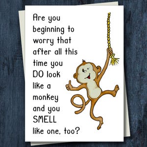 May include: A set of three ceramic mugs with a speckled, matte finish. The mugs are in shades of cream, light gray, and dark gray. Each mug has a simple, minimalist design, perfect for coffee or tea.