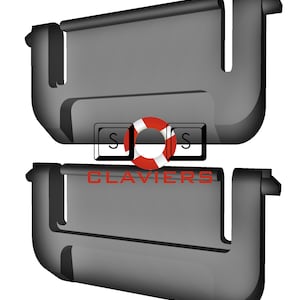 Peut inclure: Deux touches de clavier en plastique noir avec un graphisme de bouée de sauvetage rouge et la lettre "S" imprimée sur chaque touche.