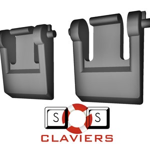 May include: Two black plastic keyboard key stabilizers. The stabilizers are designed to help keys move smoothly and prevent them from wobbling.