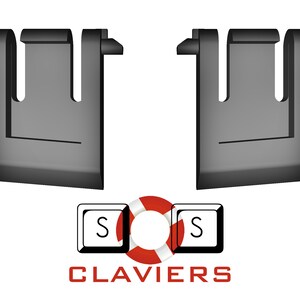 Puede incluir: Dos estabilizadores de teclado de plástico negro, diseñados para ayudar a las teclas a presionar suavemente. Los estabilizadores tienen forma de U con dos puntas a cada lado. Los estabilizadores se utilizan comúnmente en teclados mecánicos.