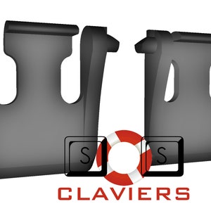 Può includere: Due clip in plastica nera con un design a forma di U. Le clip vengono utilizzate per fissare gli oggetti insieme.