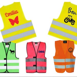 May include: A collection of safety vests in various colors, including yellow, green, pink, and orange. Some vests feature reflective stripes and personalized designs such as names, a butterfly, a tractor, a horse, and a smiley face.