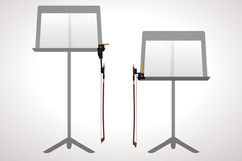May include: Two gray music stands with white pages, each holding a violin bow and a pencil. The stands have a tripod base. The bows are brown with white hair. The pencils are yellow with a black tip.