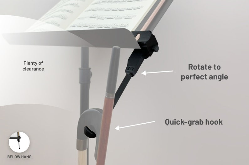 May include: A black music stand attachment with a quick-grab hook and adjustable angle. The attachment is designed to hold sheet music and provides plenty of clearance. The text on the image says "Rotate to perfect angle" and "Quick-grab hook."