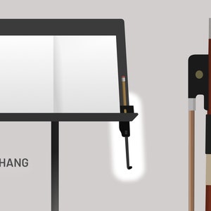 May include: Illustration of a black music stand with a pencil and a double bass bow. The music stand holds blank sheet music. The bow is brown and black. Text on the image reads "BELOW HANG 1 of 2 for double bass bows, or standing players."