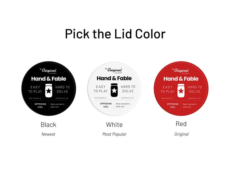May include: Three round labels with the text "The Original Jar Games Hand & Fable" in black text on a white background. The labels are black, white, and red. The text "Black", "White", and "Red" is below each label. The text "Newest", "Most Popular", and "Original" is below the color names.
