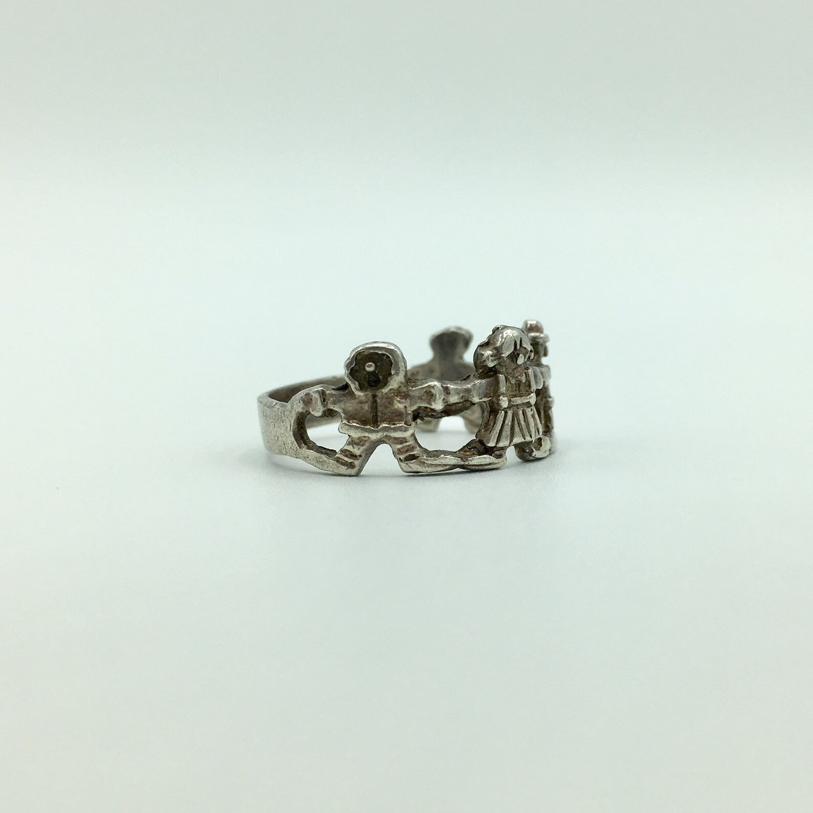 Vintage Friendship Ring Sterling Silver With 4 Figures Encircled