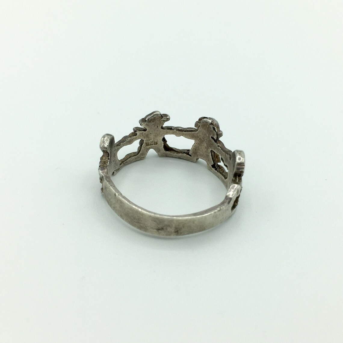Vintage Friendship Ring Sterling Silver With 4 Figures Encircled