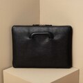 Leather laptop case with handles for MacBook Air / Pro product logo