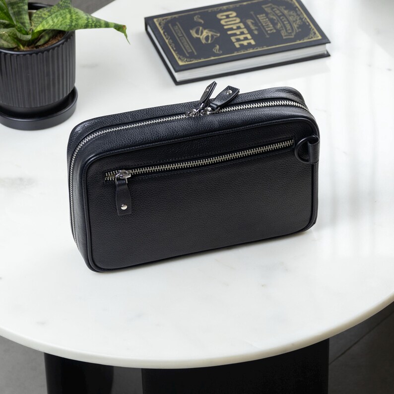Tech Pouch in leather to carry your cords, cables, adapters and EDC items. The tech pouch easily fits into your bag