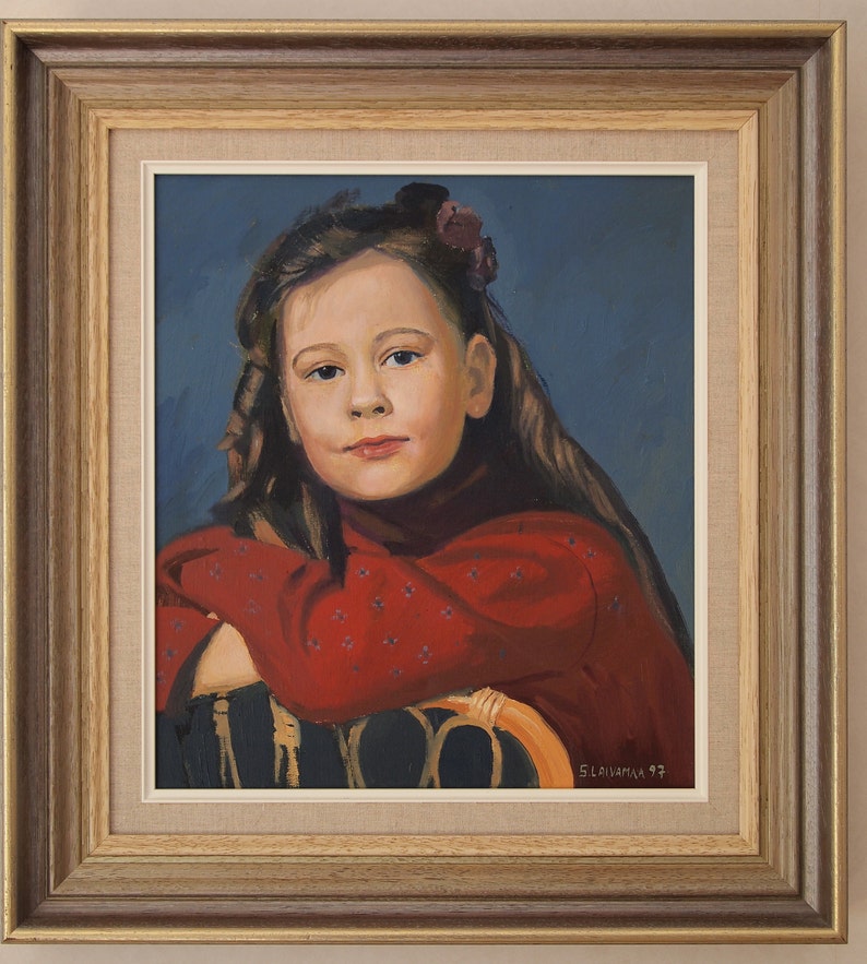 May include: A painting of a young girl with long brown hair wearing a red sweater with a floral pattern. She is sitting in a chair and looking at the viewer. The painting is signed "Slavianna 97".