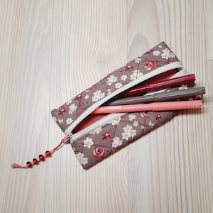Mini-trousse matelassée plate fleurs