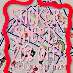May include: A stack of sticker sheets with various designs, including a teddy bear, a glass of wine, a gift box, and a cherry. The sticker sheets are surrounded by a red ribbon and the text "Sticker Sheets 20% Off! When you buy three or more!" is written in pink.