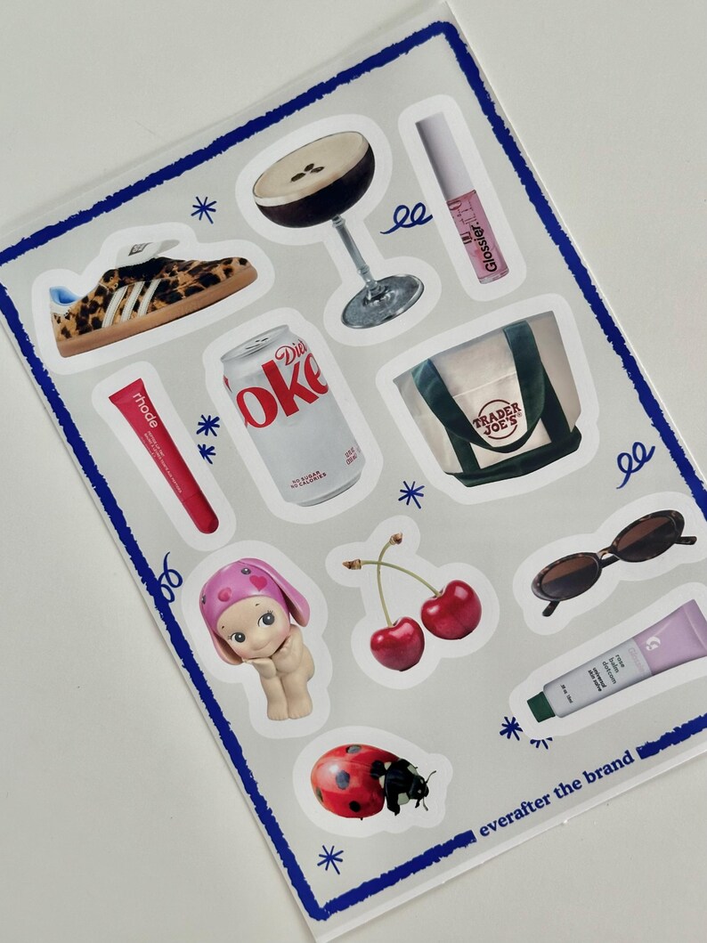 May include: A sheet of stickers featuring various designs, including a leopard print sneaker, a cocktail glass, a can of Diet Coke, a Trader Joe's tote bag, a cherry, a ladybug, a doll, sunglasses, a tube of lip gloss, and a tube of hand cream. The sheet is bordered in blue and white stars.