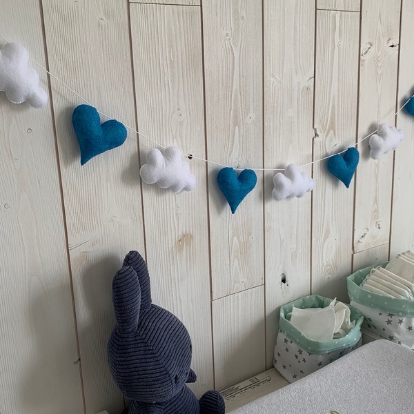 Clouds and hearts garland. Baby room decoration