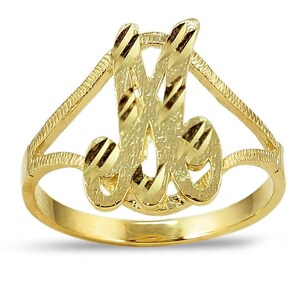 May include: A gold-tone ring with a cursive letter 'M' design. The ring is made of solid gold and has a polished finish.