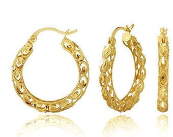 May include: A pair of gold hoop earrings with a filigree design. The earrings are made of 14k gold and have a polished finish.