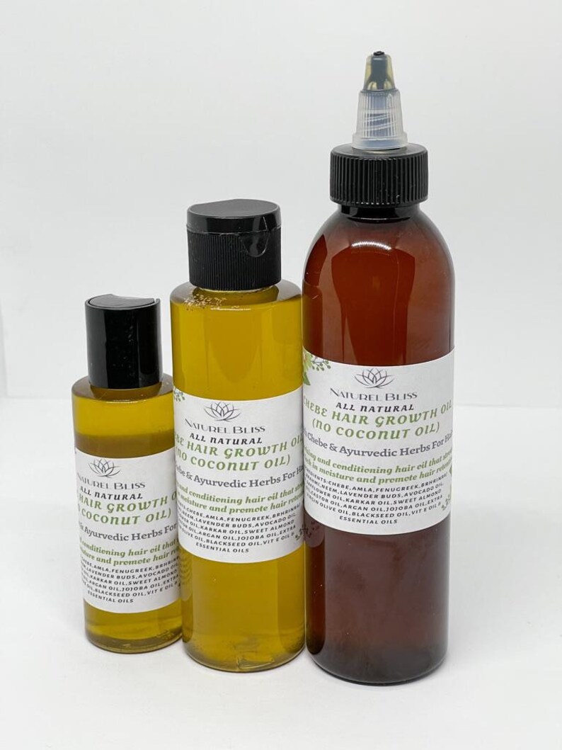 May include: Three amber glass bottles with black caps and labels. The bottles contain hair growth oil with Ayurvedic herbs. The labels read "All Natural Hair Growth Oil (No Coconut Oil)" and list ingredients including Amla, Fenugreek, Lavender Buds, Avocado Oil, and Blackseed Oil.