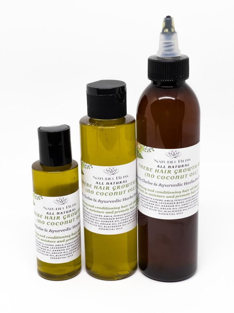 May include: Three amber glass bottles with black lids and labels. The bottles contain hair growth oil. The labels read "Naturel Bliss All Natural Chebe Hair Growth (no coconut oil) Chebe & Ayurvedic Herbs For Hair Growth".