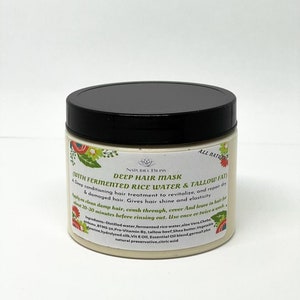 May include: A white jar with a black lid labeled "Naturel Bliss Deep Hair Mask (With Fermented Rice Water & Tallow Fat)". The label also includes a description of the product and its ingredients.